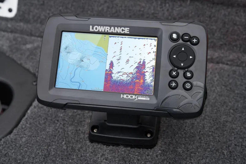 Slide: The Image of Open storage compartment in 2026 Tracker Pro Team 175 boat interior. - 19