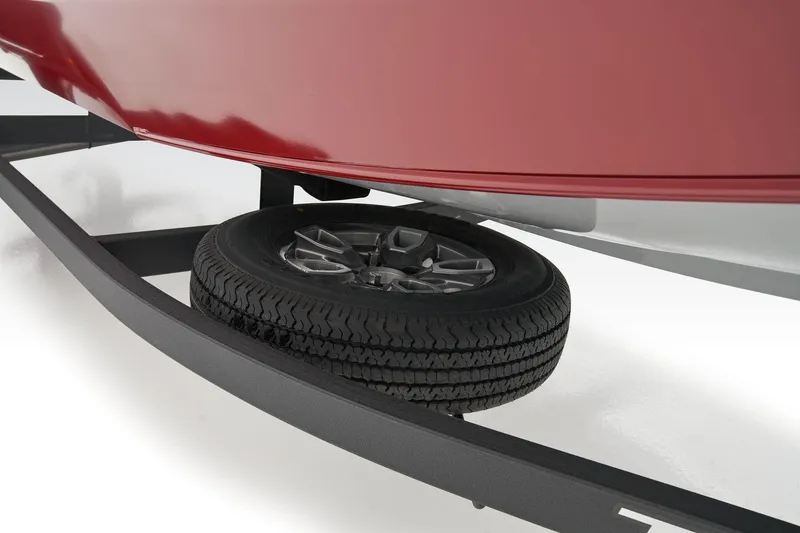 Slide: The Image of 2026 Tracker Pro Team 175 boat interior with seating and carpeted deck. - 14