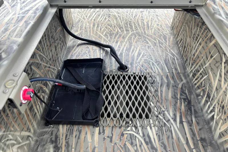 Slide: The Image of Interior of 2026 Tracker Grizzly 1650 T Prairie Wings Edition with camo design and wiring. - 16