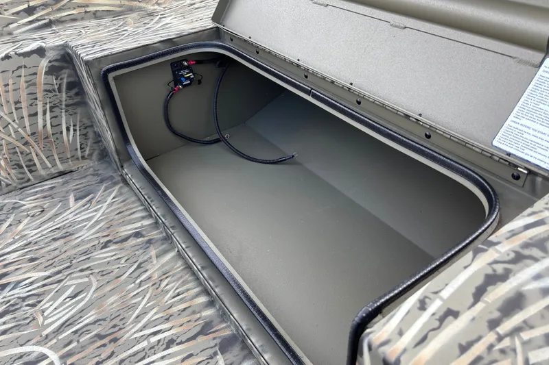 Slide: The Image of Storage compartment of 2026 Tracker Grizzly 1650 T Prairie Wings Edition boat. - 15