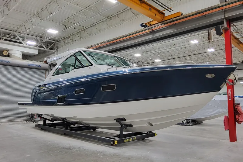 The Image of 2026 Formula 380 Super Sport Crossover OB in a showroom, showcasing sleek design. - 0