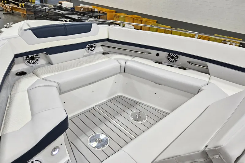 Slide: The Image of 2026 Formula 380 Super Sport Crossover OB boat interior with luxurious seating and modern design. - 10