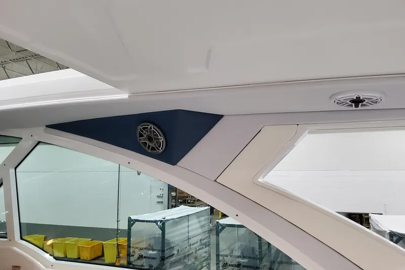 Slide: The Image of Interior view of 2026 Formula 380 Super Sport Crossover OB boat with speakers. - 102