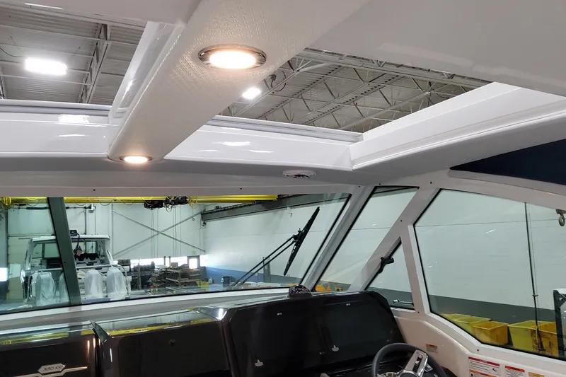 Slide: The Image of Interior view of 2026 Formula 380 Super Sport Crossover OB boat with modern lighting. - 103