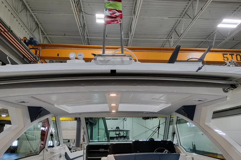 Slide: The Image of 2026 Formula 380 Super Sport Crossover OB in a warehouse, showcasing sleek design and modern features. - 106