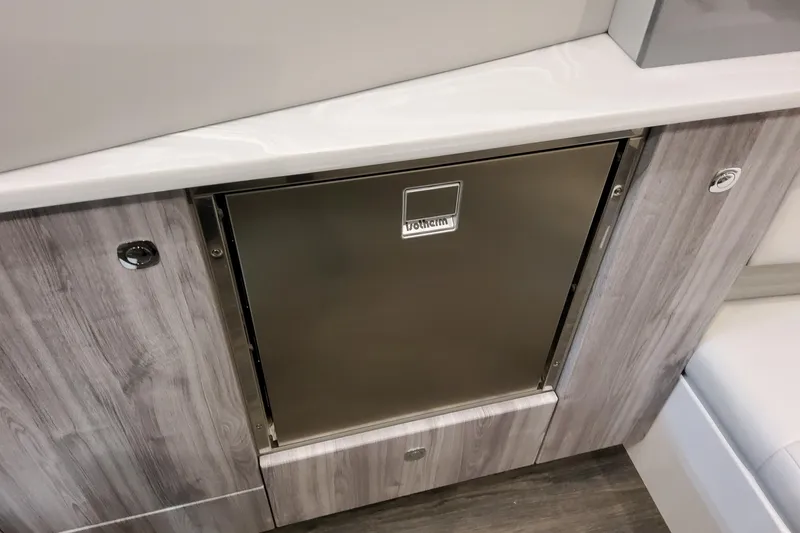 Slide: The Image of 2026 Formula 380 Super Sport Crossover OB interior with stainless steel cabinet. - 115