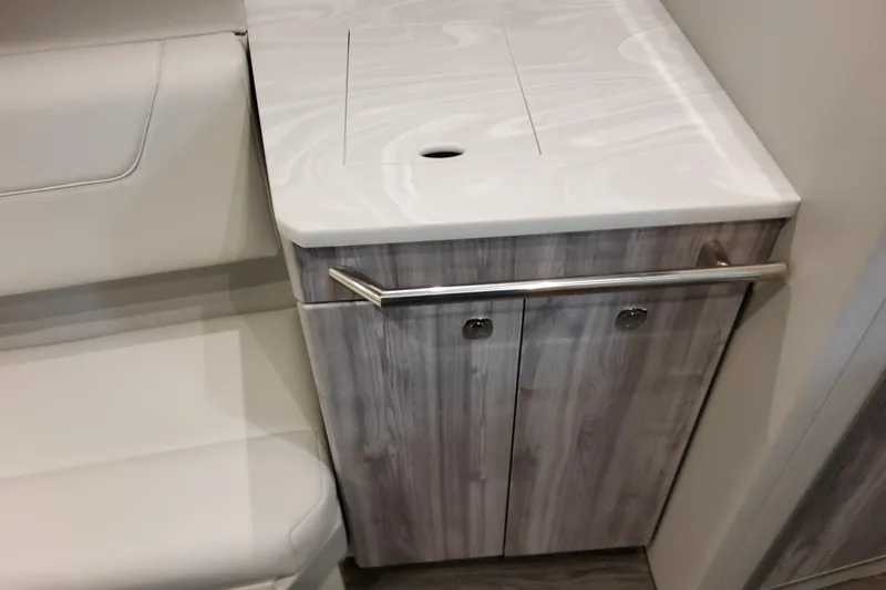 Slide: The Image of Interior of 2026 Formula 380 Super Sport Crossover OB, featuring sleek cabinetry and seating. - 120