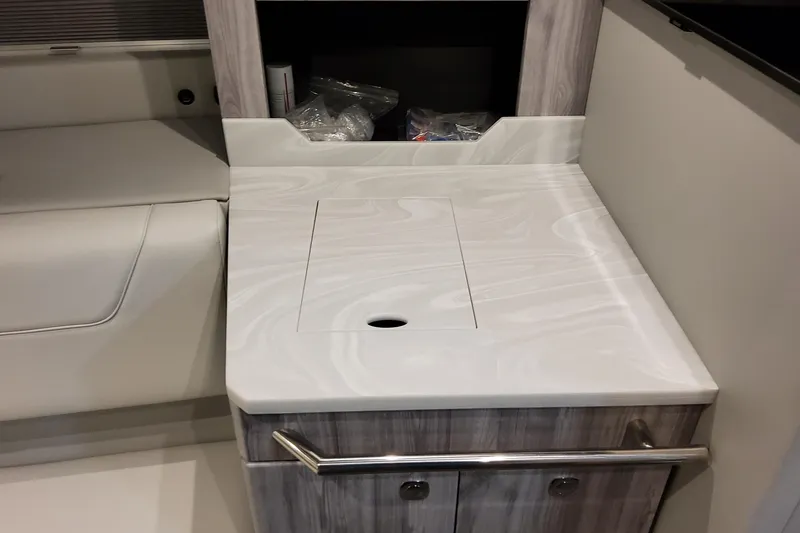 Slide: The Image of 2026 Formula 380 Super Sport Crossover OB interior with sleek countertop and storage. - 122