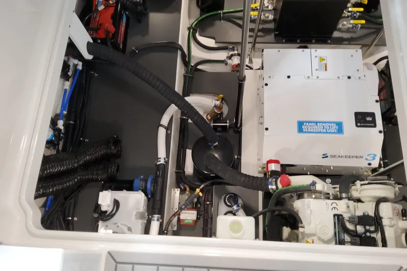 Slide: The Image of Engine compartment of 2026 Formula 380 Super Sport Crossover OB with Seakeeper 3 stabilizer. - 137