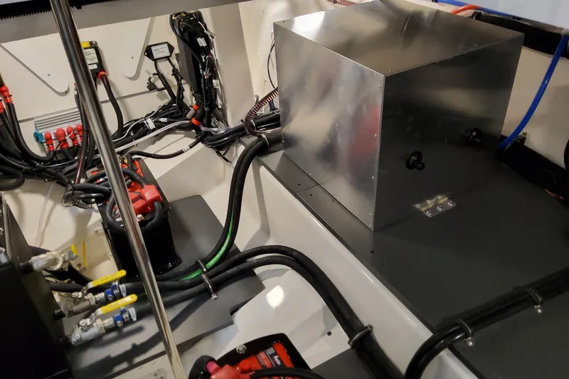 Slide: The Image of Engine compartment of 2026 Formula 380 Super Sport Crossover OB with wiring and components. - 141