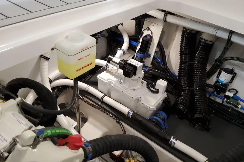 Slide: The Image of Engine compartment of 2026 Formula 380 Super Sport Crossover OB with Westerbeke coolant system. - 144