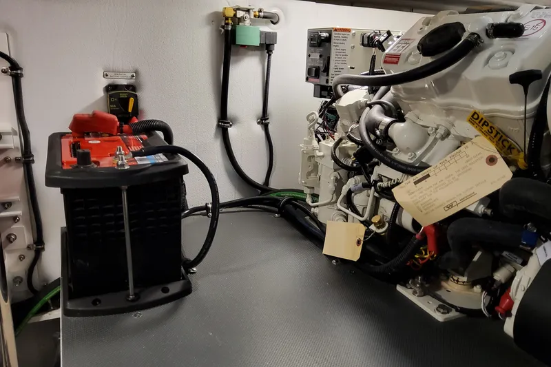 Slide: The Image of Engine room of 2026 Formula 380 Super Sport Crossover OB with battery and wiring. - 147