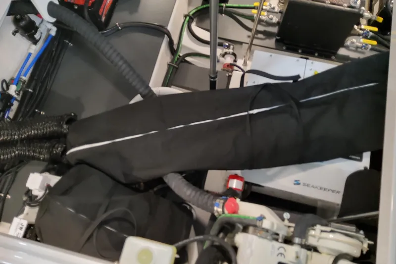 Slide: The Image of Engine compartment of 2026 Formula 380 Super Sport Crossover OB with Seakeeper system. - 152