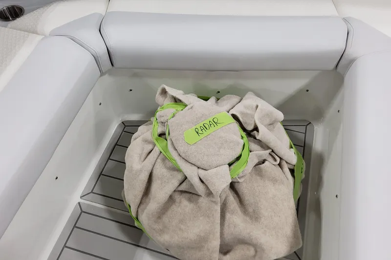 Slide: The Image of 2026 Formula 380 Super Sport Crossover OB storage compartment with covered radar equipment. - 153