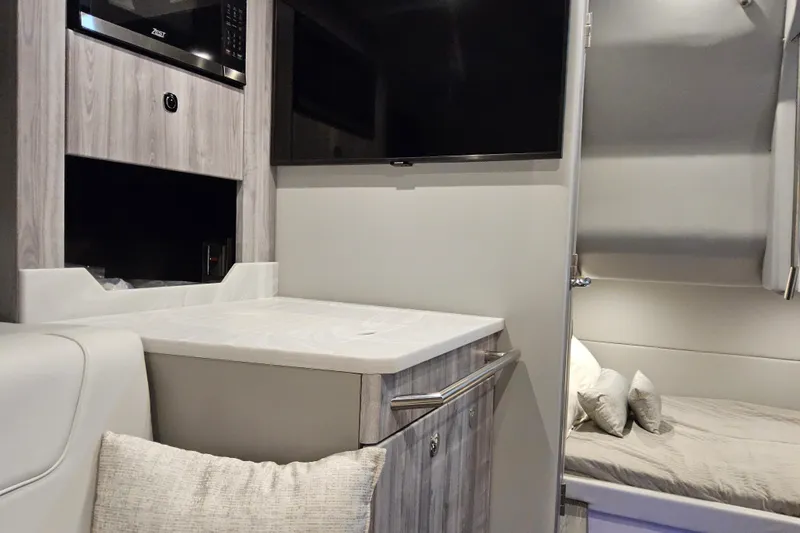 Slide: The Image of Interior of 2026 Formula 380 Super Sport Crossover OB, featuring modern amenities and sleek design. - 16