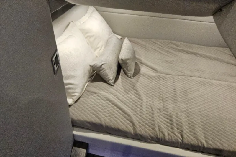 Slide: The Image of Interior cabin of 2026 Formula 380 Super Sport Crossover OB with cozy bedding. - 18