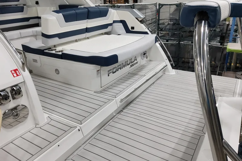Slide: The Image of 2026 Formula 380 Super Sport Crossover OB boat interior with sleek seating and modern design. - 39