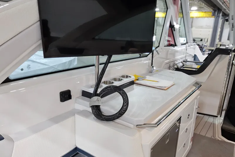 Slide: The Image of Interior of 2026 Formula 380 Super Sport Crossover OB with TV and counter space. - 6