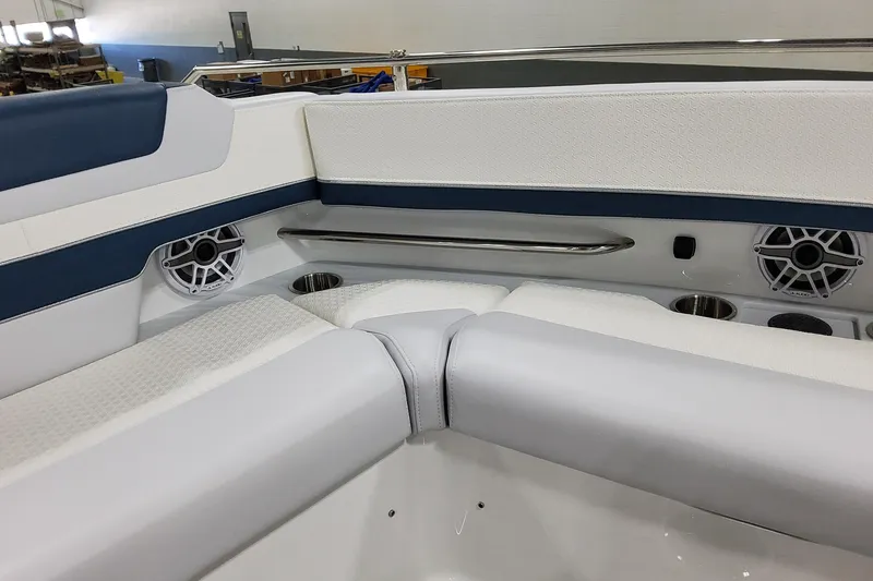 Slide: The Image of 2026 Formula 380 Super Sport Crossover OB interior with cushioned seating and built-in speakers. - 60