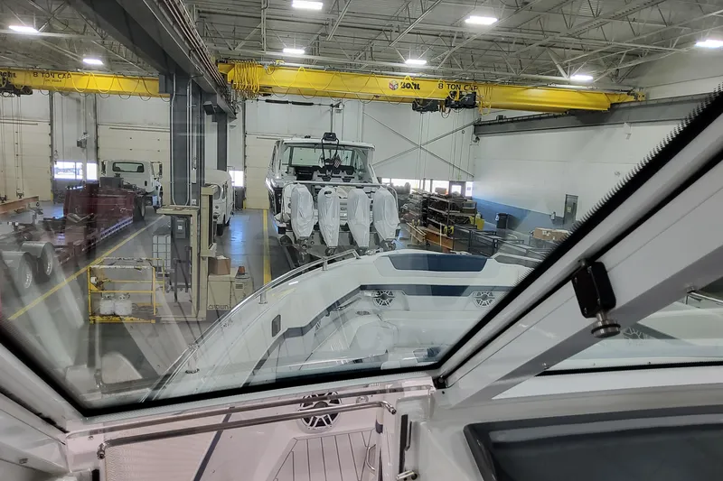 Slide: The Image of 2026 Formula 380 Super Sport Crossover OB in a factory setting, viewed from inside. - 70