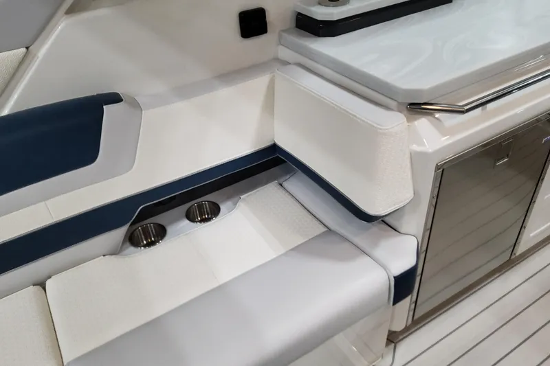 Slide: The Image of 2026 Formula 380 Super Sport Crossover OB interior with seating and cup holders. - 84