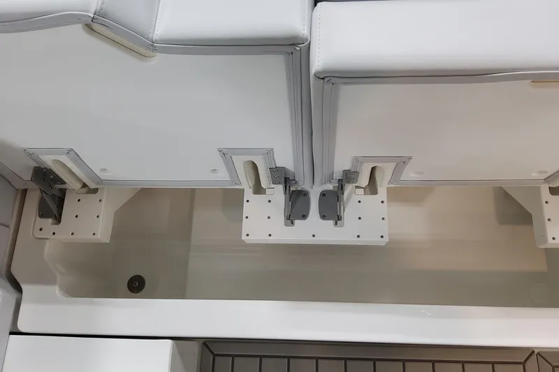 Slide: The Image of 2026 Formula 380 Super Sport Crossover OB boat seating and storage compartment detail. - 99