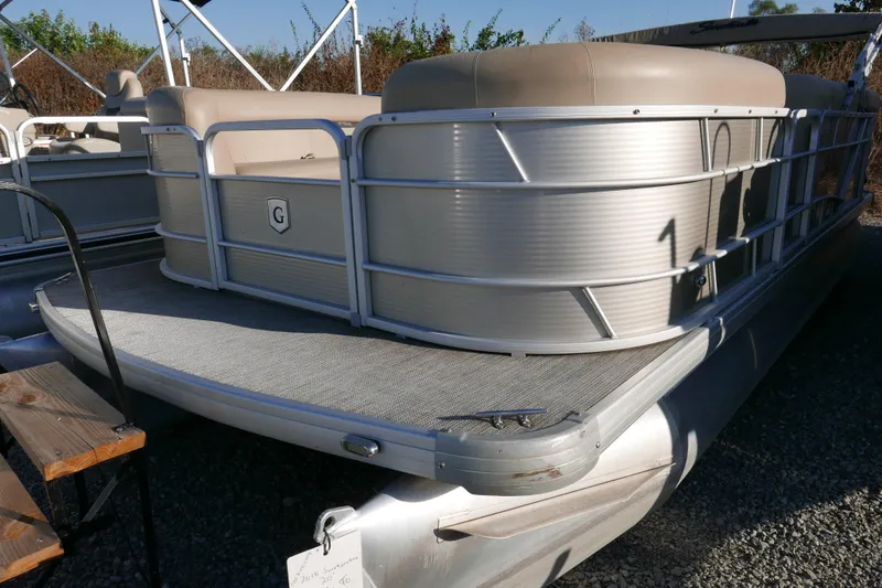 Slide: The Image of 2018 Sweetwater SW2086c pontoon boat with beige seating and aluminum railing. - 3