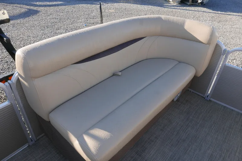 Slide: The Image of Beige seating on 2018 Sweetwater SW2086c pontoon boat, outdoor setting. - 8