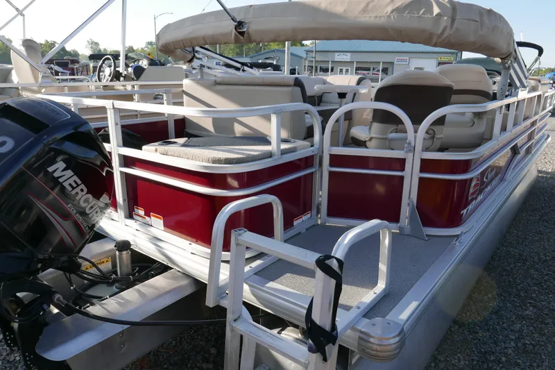 Slide: The Image of 2018 SUNTRACKER Fish N Barge 20 pontoon boat with Mercury engine, rear view. - 3