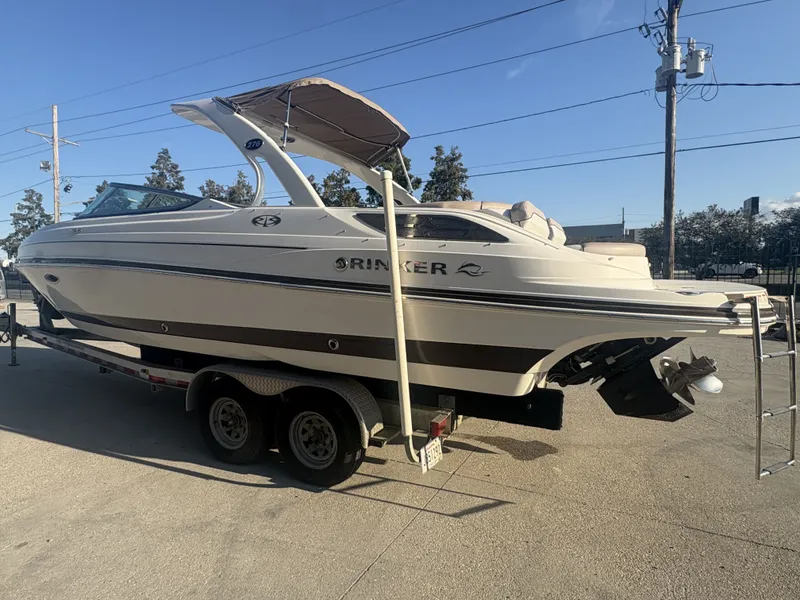 Slide: The Image of 2013 Rinker Captiva 276 boat on trailer at The Boat Yard. - 3