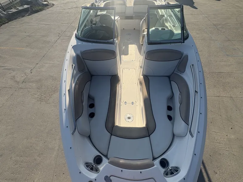 Slide: The Image of 2013 Rinker Captiva 276 boat with spacious seating and sleek design. - 7