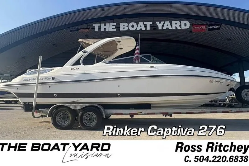 The Image of 2013 Rinker Captiva 276 boat on trailer at The Boat Yard. - 0