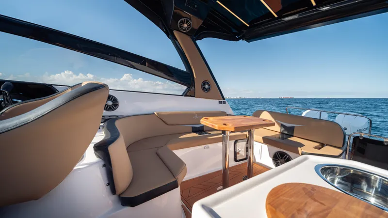 Slide: The Image of Luxurious interior of 2025 Hanover 305 yacht with ocean view and modern seating. - 21