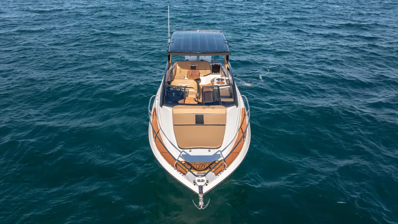 Slide: The Image of 2025 Hanover 305 boat on open water, aerial view. - 3