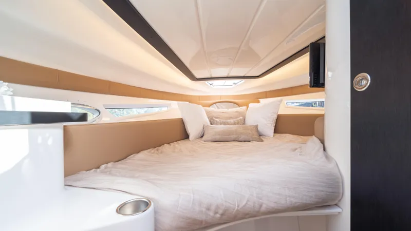 Slide: The Image of Luxurious cabin interior of 2025 Hanover 305 yacht with cozy bedding. - 31