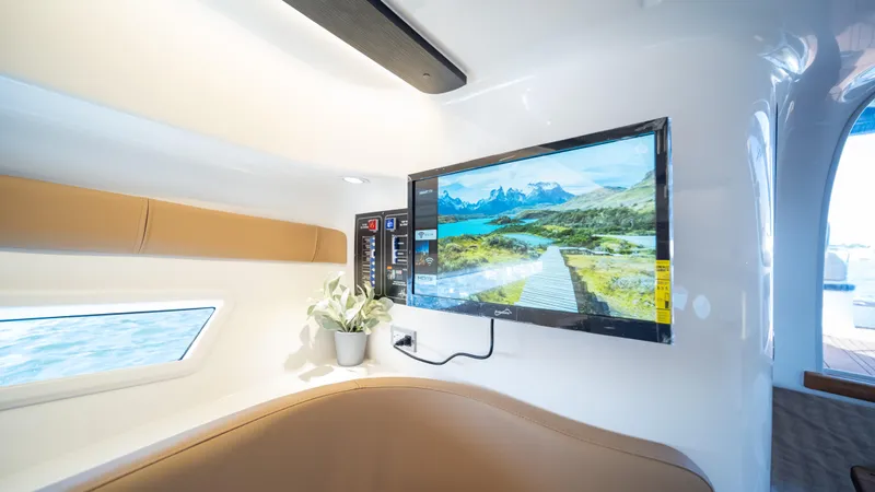 Slide: The Image of Luxurious interior of 2025 Hanover 305 yacht with TV and scenic view. - 33