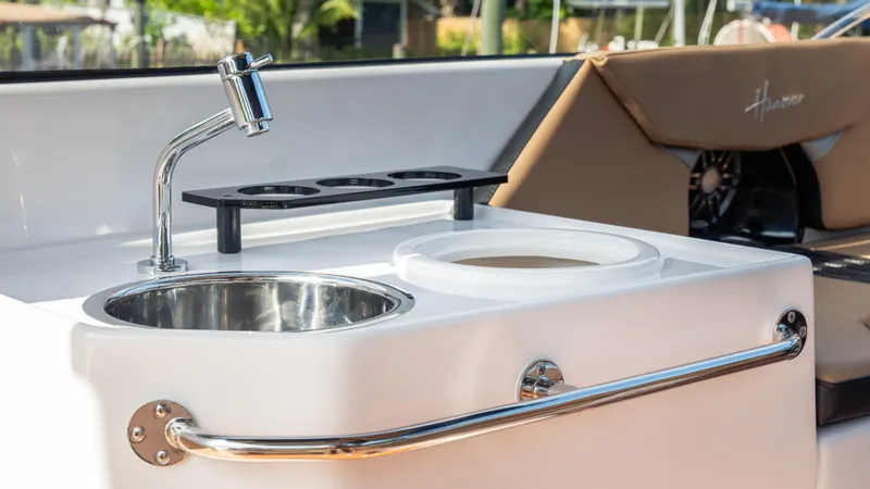 Slide: The Image of 2026 Hanover 305 boat sink and seating area with modern design. - 45