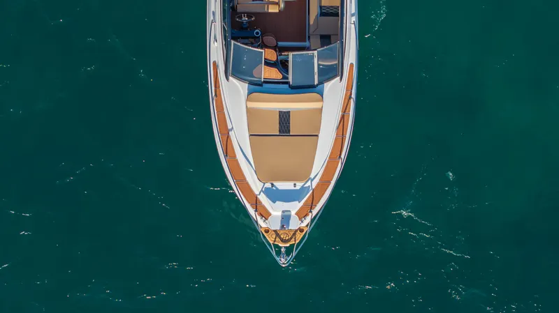 Slide: The Image of Aerial view of 2025 Hanover 305 yacht on turquoise water. - 6
