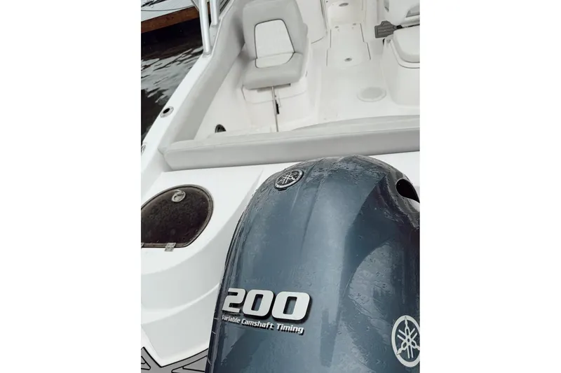 Slide: The Image of 2022 Seafox 226 Traveler boat with Yamaha 200 engine, featuring spacious seating. - 6
