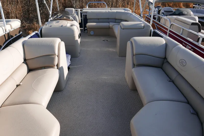 Slide: The Image of Luxurious 2012 Xcusrion x2312 pontoon boat with spacious beige seating and modern design. - 5