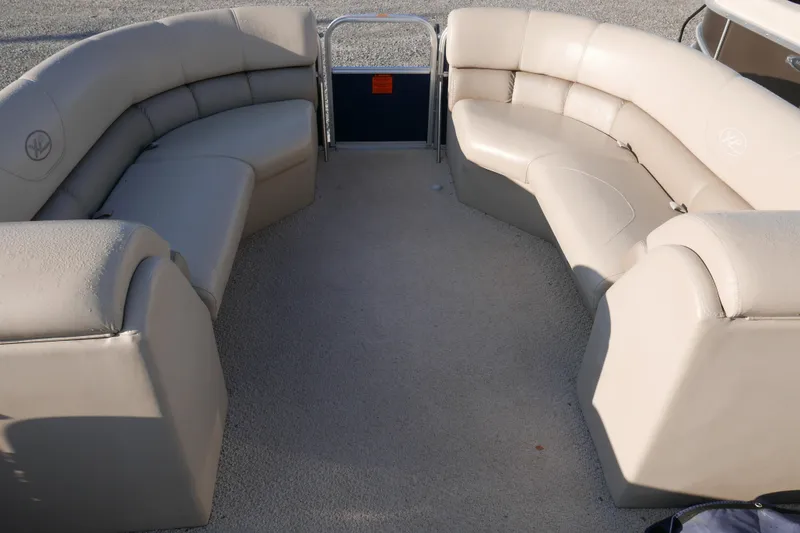 Slide: The Image of Luxurious seating on 2012 Xcusrion x2312 boat, featuring beige upholstery and spacious layout. - 6