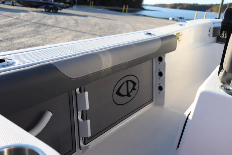 Slide: The Image of 2024 Sea Born LX22 Center Console boat interior with storage compartment and seating. - 14