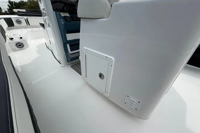 Slide: The Image of 2026 Tidewater 2700 Carolina Bay boat interior with sleek white design and modern features. - 36