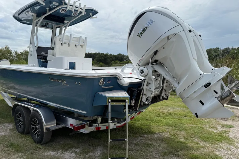 Slide: The Image of 2026 Tidewater 2700 Carolina Bay boat on trailer with Yamaha outboard motor. - 7
