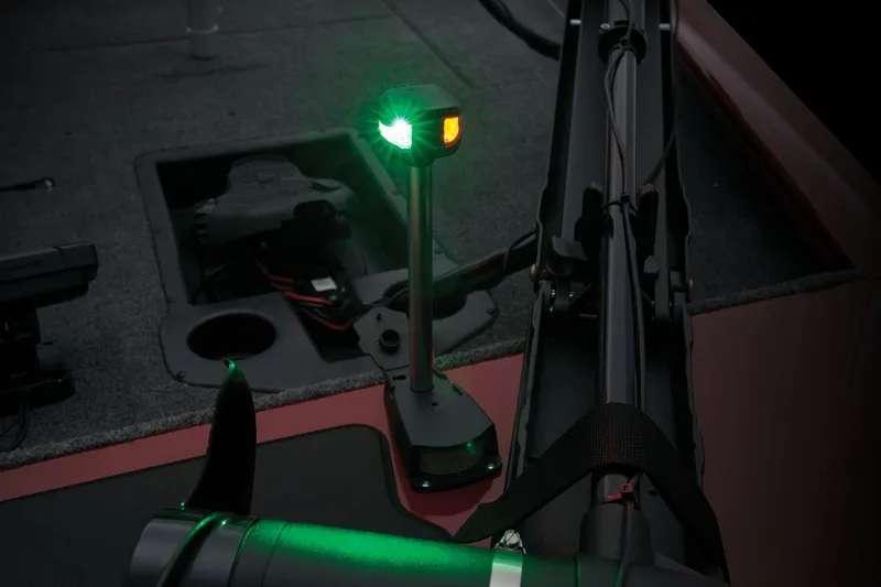 Slide: The Image of Manufacturer Provided Image: 2025 Tracker Pro Team 175 boat with illuminated navigation lights at night. - 30