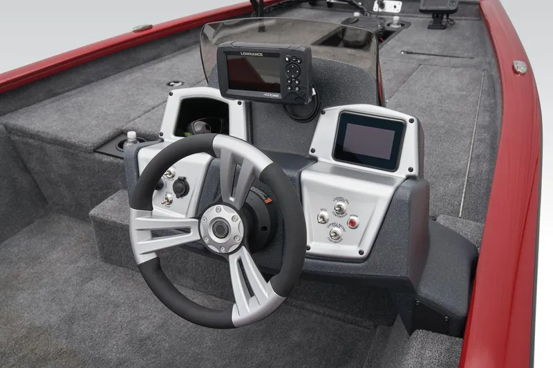 Slide: The Image of Manufacturer Provided Image: 2025 Tracker Pro Team 175 boat dashboard with steering wheel and electronic displays. - 40