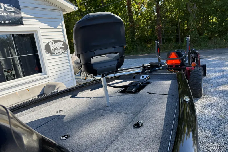 Slide: The Image of 2025 Tracker Pro Team 175 boat with fishing seat and equipment on deck. - 6