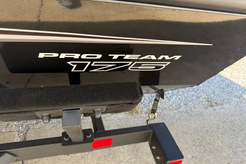Slide: The Image of 2025 Tracker Pro Team 175 boat rear view with model name displayed. - 9