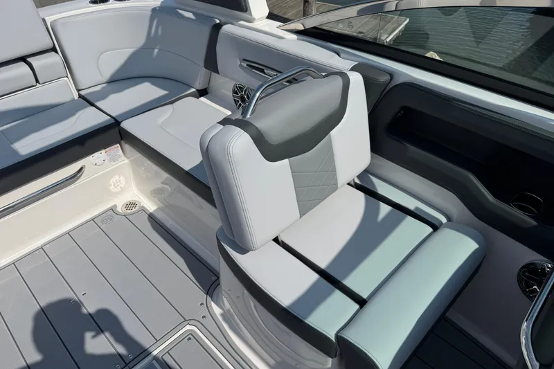 Slide: The Image of 2025 Chaparral 247 SSX boat interior with sleek, modern seating and stylish design. - 10