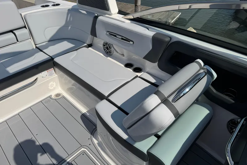 Slide: The Image of 2025 Chaparral 247 SSX boat interior with luxurious seating and modern design. - 11